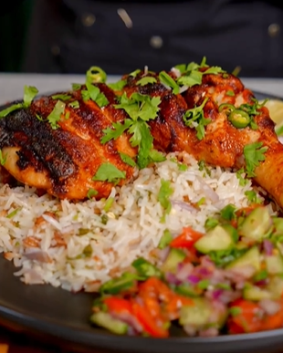 A plate of food with rice and vegetables.