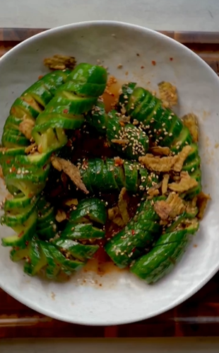 A plate of food with some type of meat and vegetables