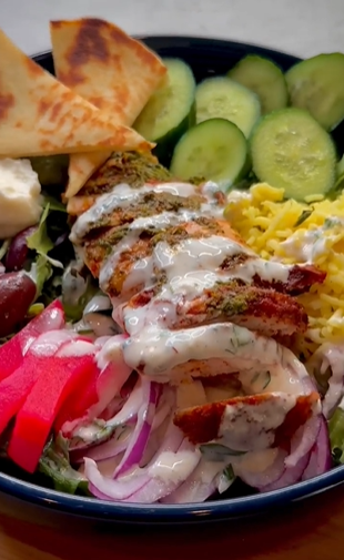 A close up of food with dressing on it