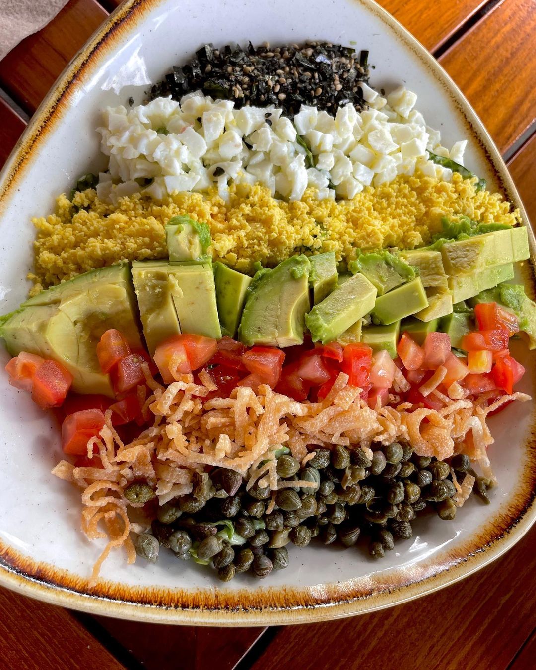 A plate of food with many different ingredients.